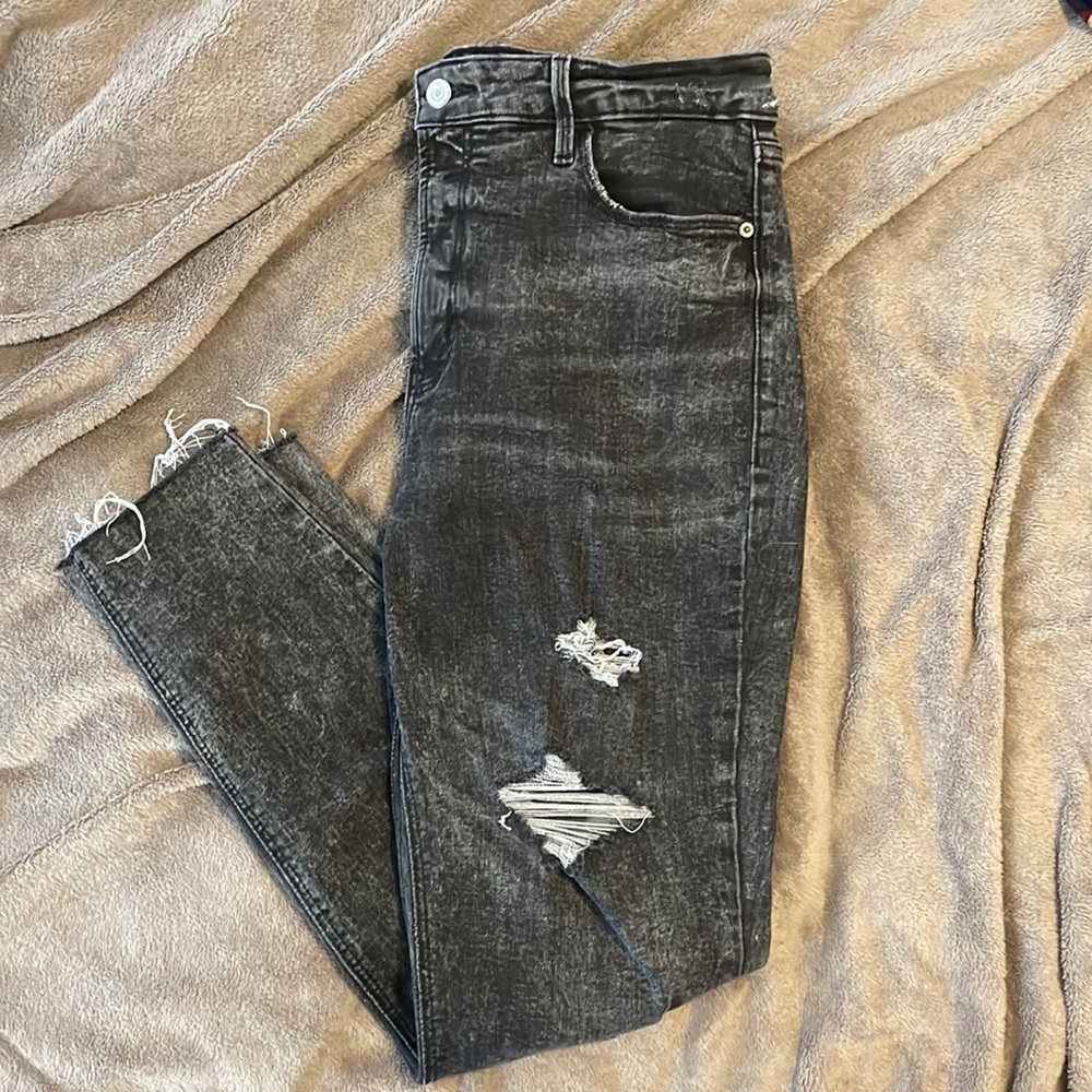 Black skinny jeans with rips